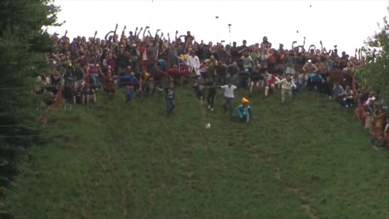 WATCH:  Racers barrel downhill in cheese-roll chase