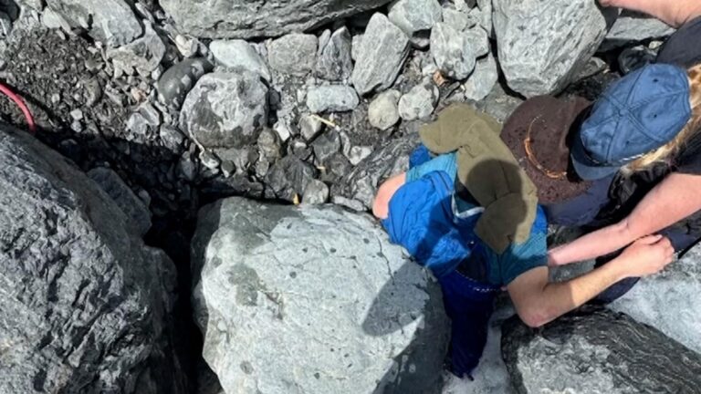 WATCH:  Man survives being pinned down by 700-pound boulder for 3 hours in Alaska creek