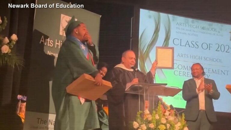 WATCH:  High school graduate gets job offer while walking across stage to receive diploma