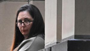 An Australian woman on trial for triple murder testifies over mushroom poisoning
