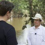 Trapped by floodwater, camp director called to say she ‘can’t get out’