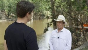 Trapped by floodwater, camp director called to say she ‘can’t get out’