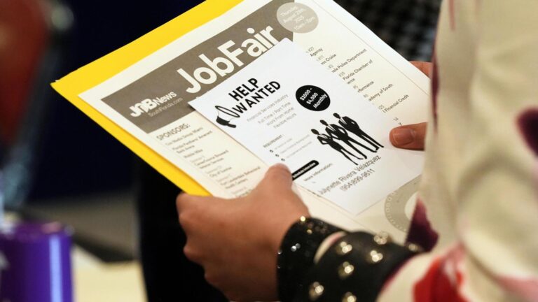 Applications for jobless benefits jump to 263,000 last week, most in nearly 4 years